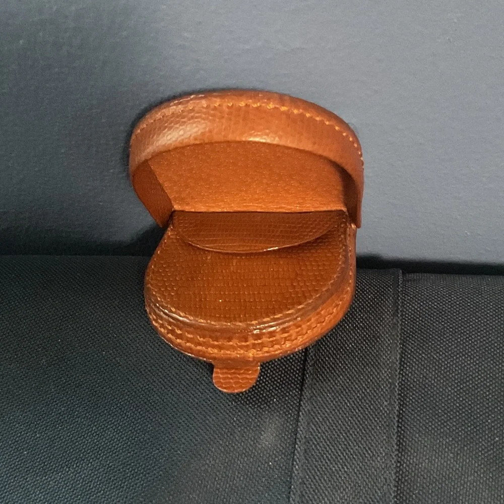Handcrafted tan leather coin purse horseshoe shape for easy access to change